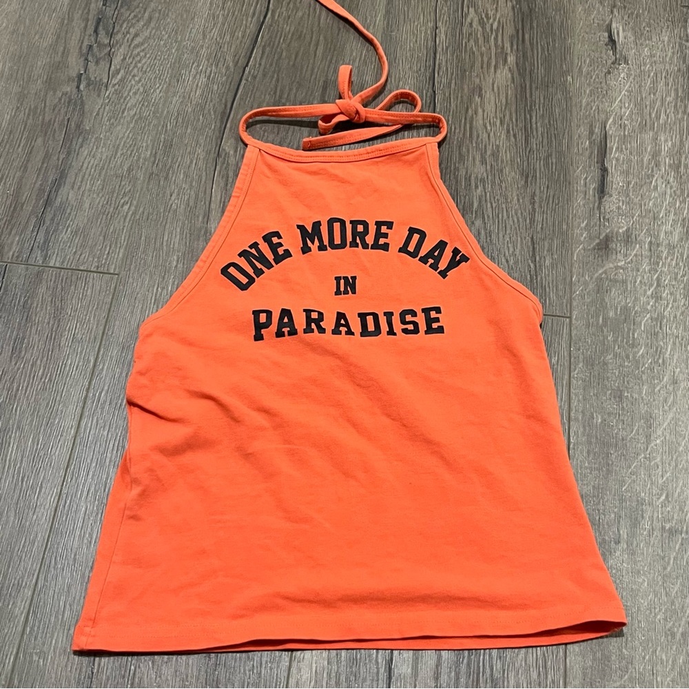 2010s orange high neck tie halter top 
with "one more day in paradise" font